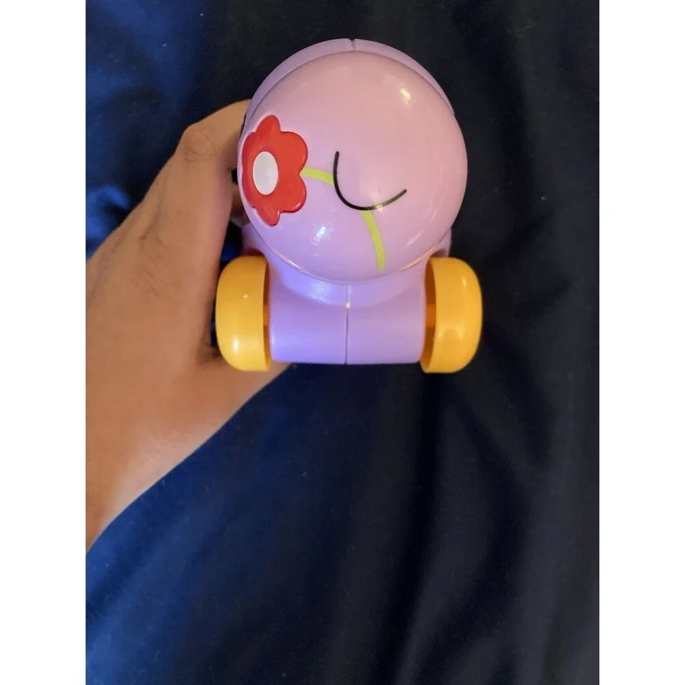 Fisher-Price Poppity Pop Purple Hippo Roller Car Baby Toy Popper Hippopotamus